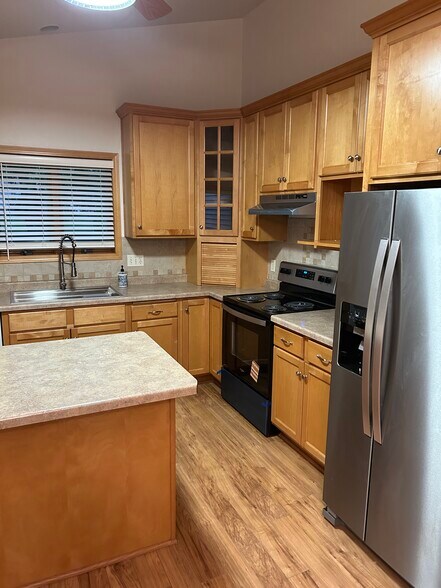 Kitchen with updated appliances - 5225 W Anita St