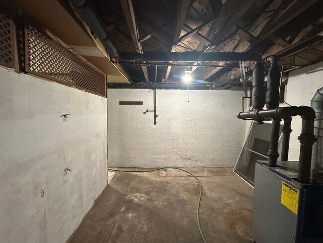 Building Photo - House in Bedford with Lot of Outdoor Space.