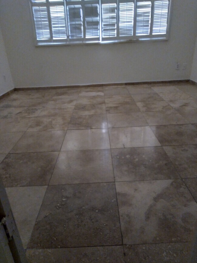 **TRAVERTINE FLOORING** - 6734 N 19th St