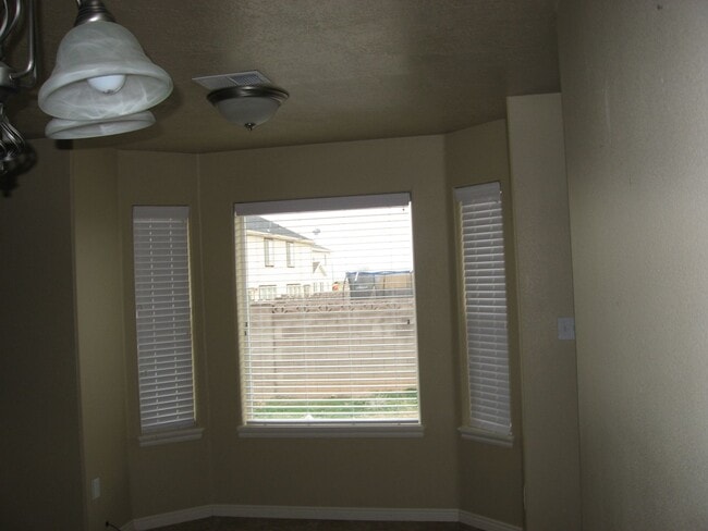 Building Photo - Spacious Home with Backyard