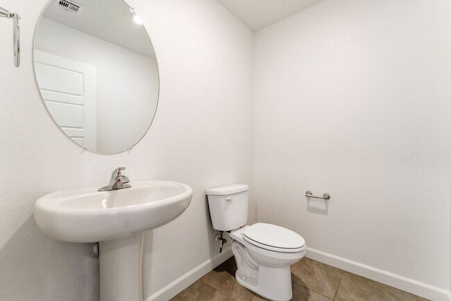 Building Photo - Modern Gated Townhome Living with Resort-Style Community Amenities