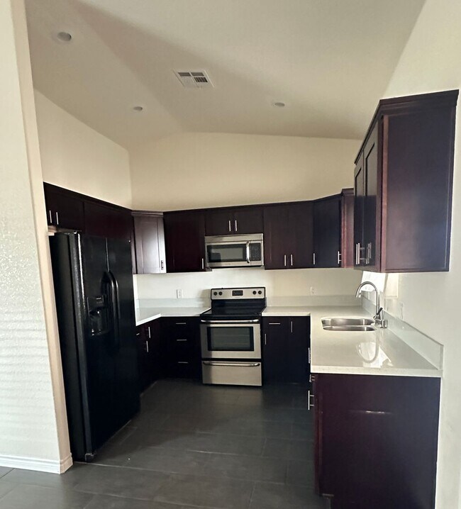 Building Photo - 10266 S Tornado Ave