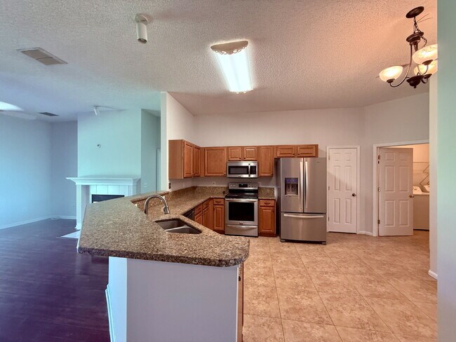 Building Photo - Stunning Lakefront Retreat: 3BR/2BA Home w...