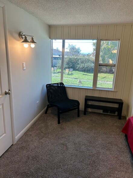 Bedroom 2 sitting area - 1766 E S Woodside Dr