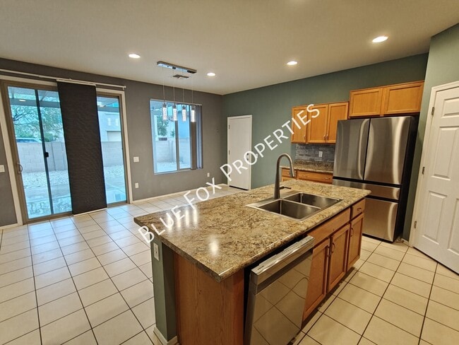 Building Photo - 10947 E Passion Flower Ln