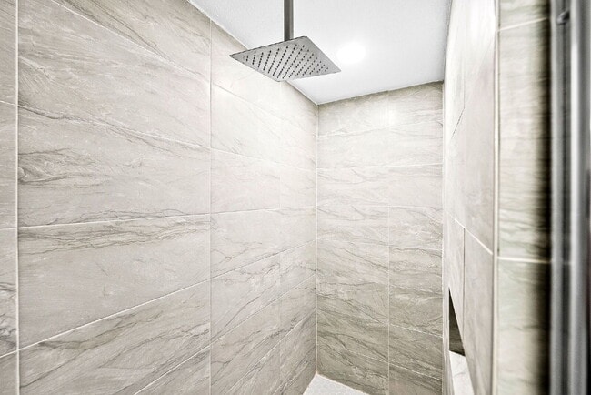 Building Photo - A Waterfall Shower, a Sunroom, and a Story Worth Coming Home To