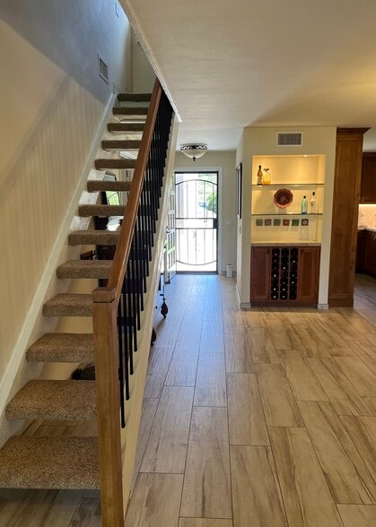 stairs to loft and wine cubby - 17738 Valle de Lobo Dr