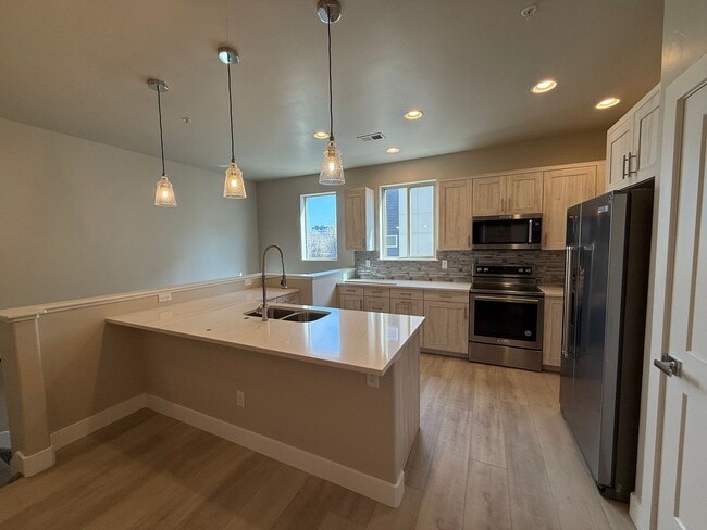 Building Photo - Modern Townhouse with Rooftop Deck & Mountain Views Near Sloan’s Lake!!