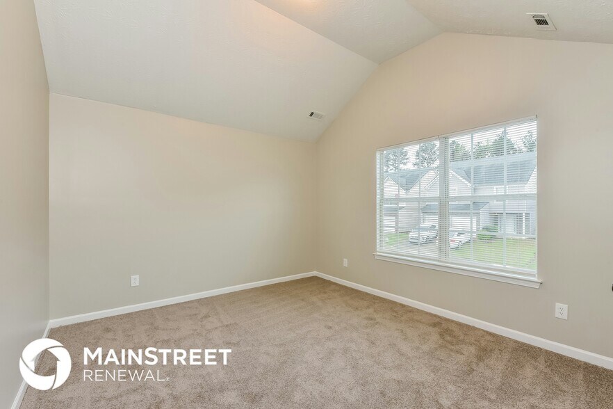Building Photo - 7548 Garnet Dr