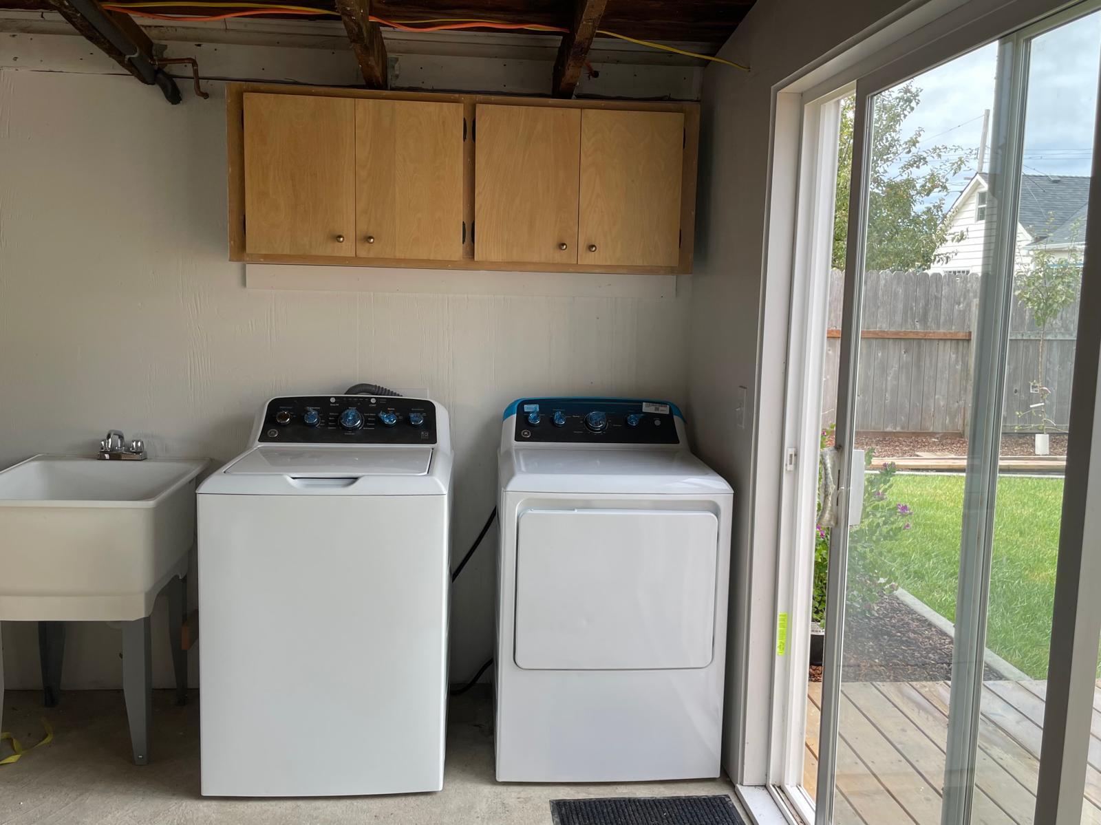 Washer Dryer included in large utility room connected to kitchen - 667 Herbert St