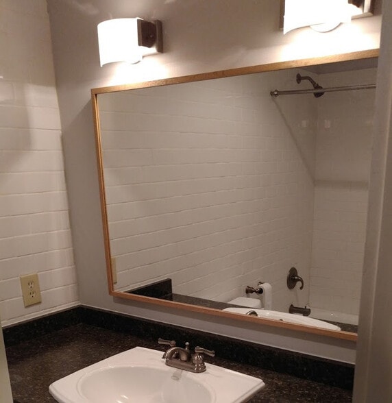 Second Bedroom Separate Bath (with subway tiles throughout) - 100 W Market St