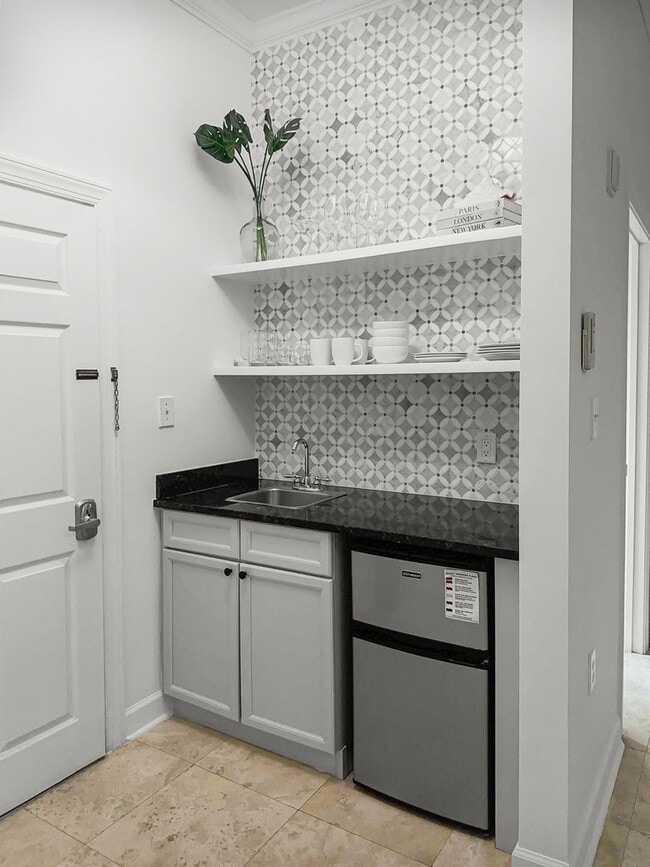 Building Photo - 50% off first months rent.  Fully furnishe...