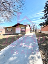 Building Photo - Spacious 4-Bedroom Home with Private Primary Suite & Hardwood Floors!