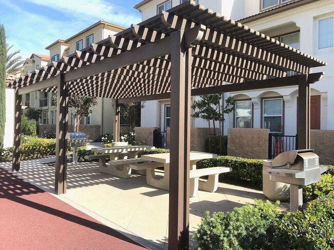 Building Photo - Beautiful 4 Bedroom Condominium with Attached Garage Located in Gated Community of Eastvale