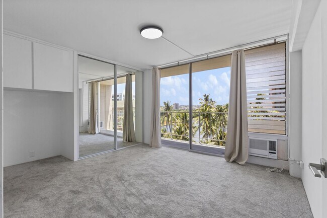 Building Photo - Waikiki 1BR/1BA with Ala Wai Canal & Mountain Views — Wraparound Lanai, Utilities Included