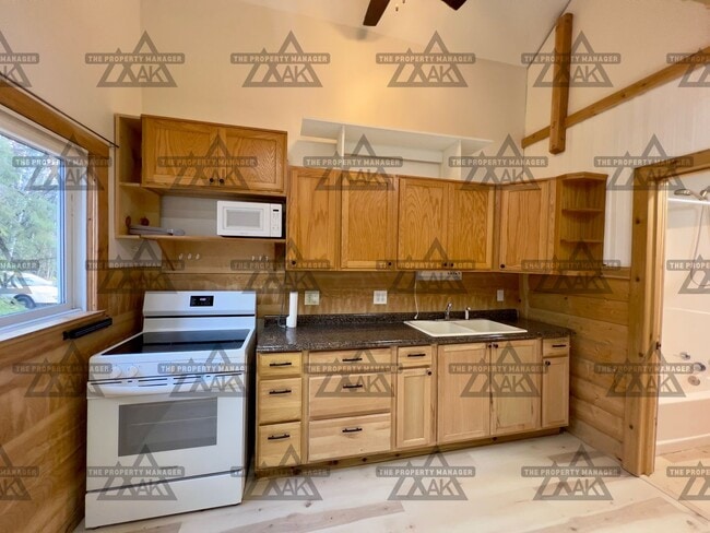 Building Photo - Cozy 1-Bedroom Loft Home with Office & Cov...