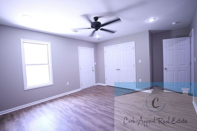 Building Photo - Move in special $650!! Luxury 2 bed, 1 bath duplex - new construction!! Washer and dryer and util...