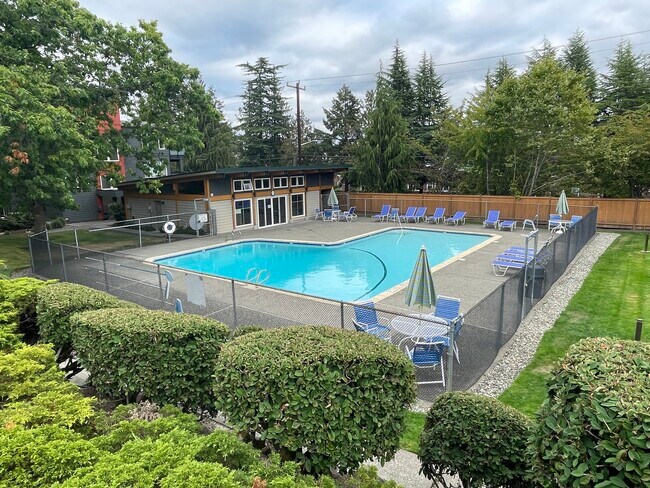 view of swimming pool and cabana - 7001 Sand Point Way NE