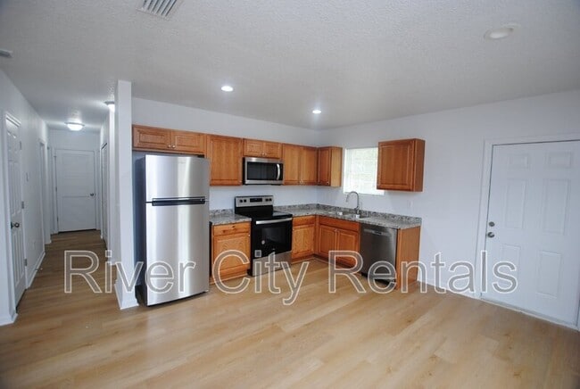 Building Photo - 5749 Silver Sands Cir