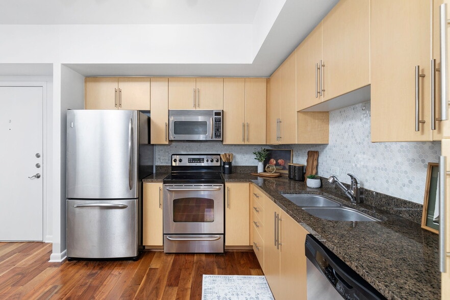 stainless steel appliances - 54 Rainey St