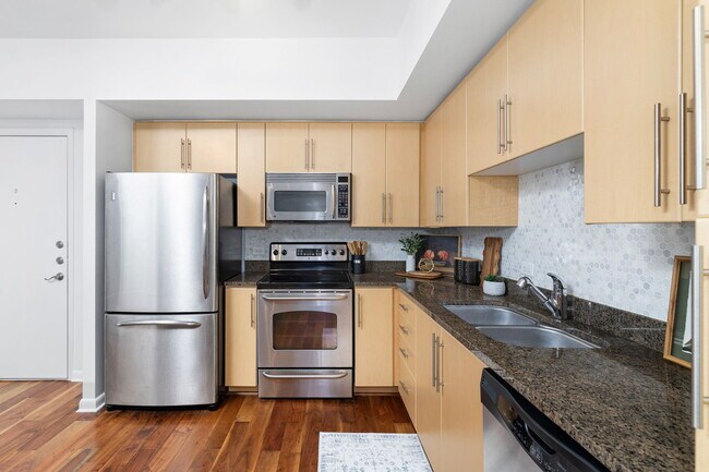 stainless steel appliances - 54 Rainey St