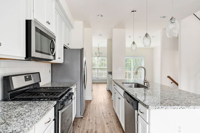 Building Photo - Your Next Home: Modern 3-Level Townhome with Garage, Deck & Huge Flex Space