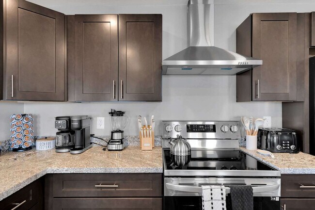 Building Photo - 6240 E River Rd