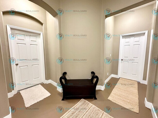 Building Photo - Open Kitchen, Expansive Living, and Covered Patio in Tranquil South Reno Near Trails, Parks & Sho...