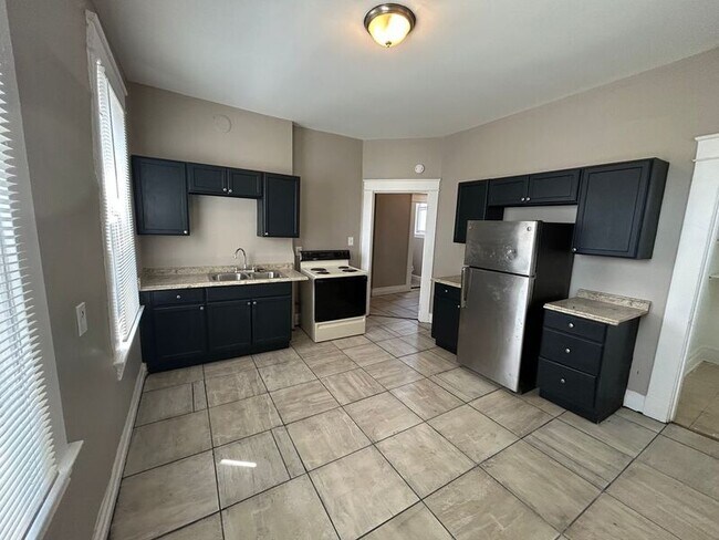 Building Photo - 1214 Iliff Ave