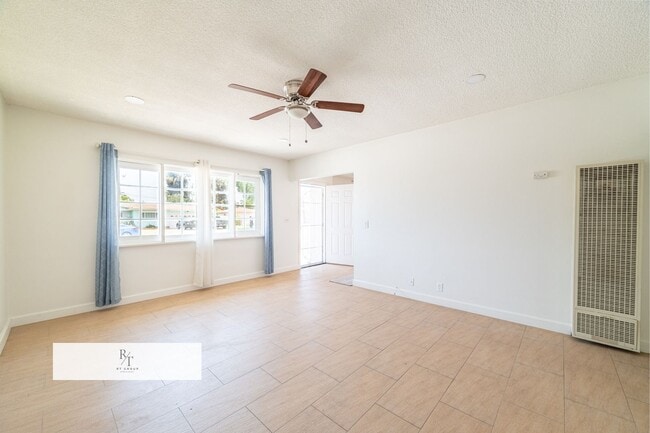 Building Photo - Remodeled House with Spacious Flat Lot - L...