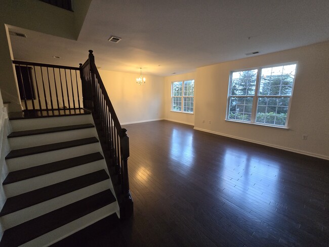 Spacious first floor open concept living and dining room - 39 Station Sq