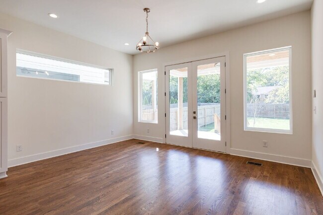 Building Photo - "Charming 4-Bedroom Nashville Oasis with Elegant Hardwood Floors & Private Guest Suite!"