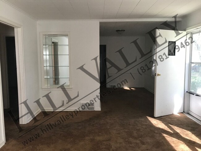 Building Photo - Three bedroom, 1 1/2 bath - East