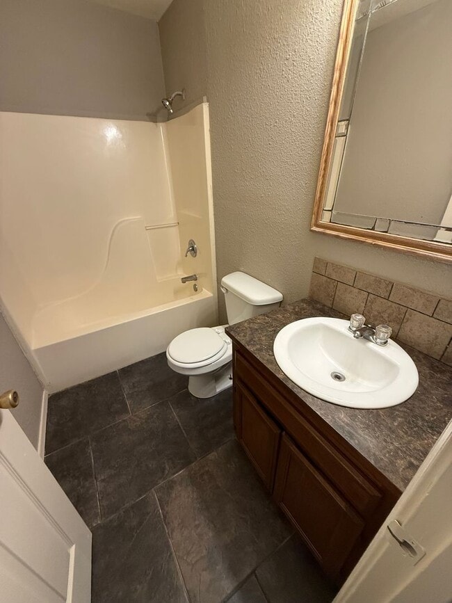 Building Photo - 3 Bed 2 Bath With His & Her Closets upstairs.  Yard Care Included.