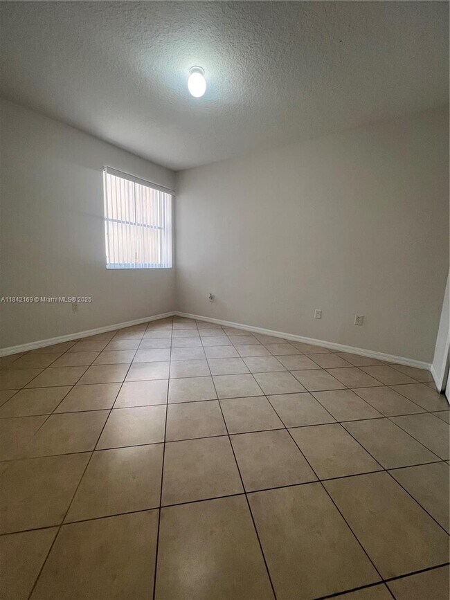 Building Photo - 6340 NW 114th Ave