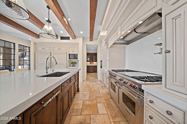 Building Photo - 9290 E Thompson Peak Pkwy