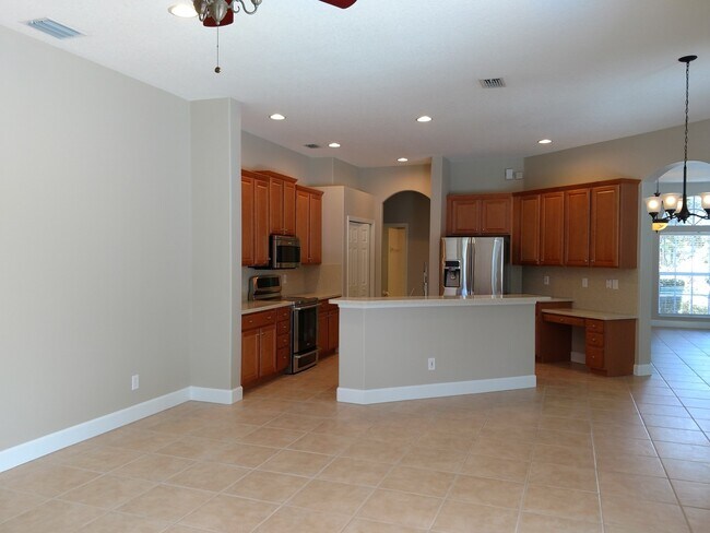 Building Photo - Annual Rental: Luxurious 4 Bedroom 3 bath POOL home in Woodlands of Rivendell! Just Blocks form P...
