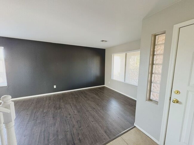 Building Photo - 4BR / 2.5BA Home with Expansive Lot – 2-Car Garage, Community Pools & Golf