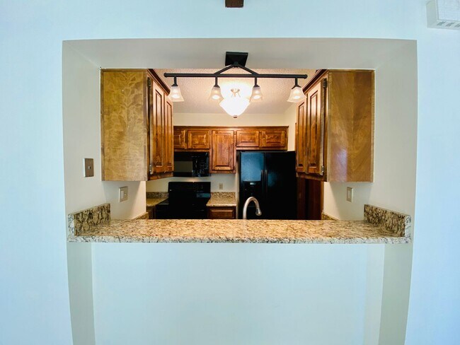 Building Photo - {12030 - F}  Updated Condo in Fantastic Location + Top Floor + Covered Parking Included + Private...