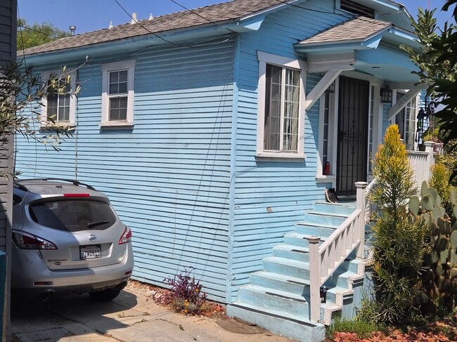 Rental Unit, separated by length greater than other tenants car - 1644 Mohawk St