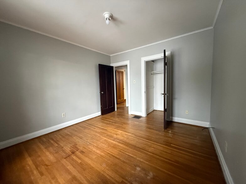 Primary bedroom from door to office/flex space - 40 W Tompkins St