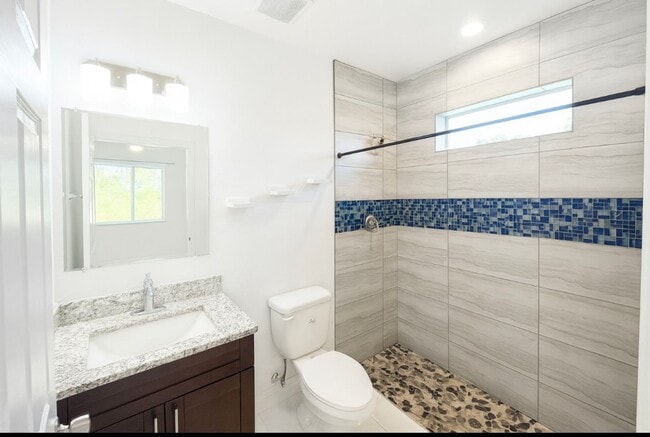 Building Photo - MUST SEE -2/2/1+OPEN DEN-DUPLEX IN GREENBR...