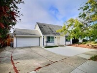 Building Photo - 4 BD/2 BA Home with Spacious Backyard and ...