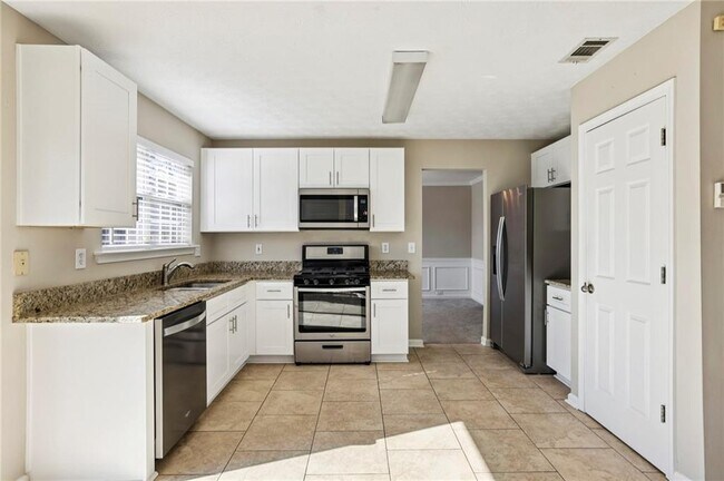 Building Photo - 1348 Woodcutt Pl