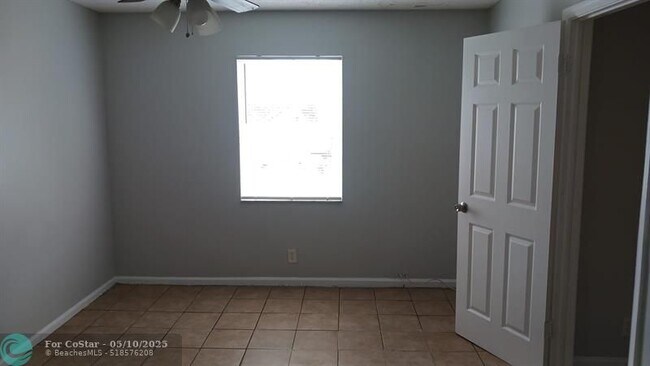 Building Photo - 2421 NW 56th Ave
