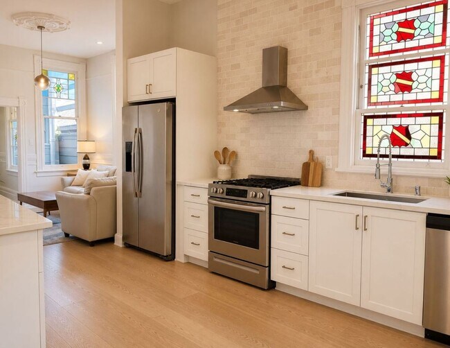 Building Photo - Timeless Character. Modern Lifestyle. Unbeatable Location.