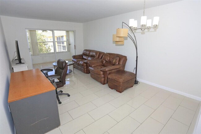 Building Photo - 8225 Sunrise Lakes Blvd