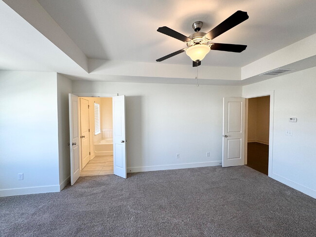Building Photo - Stylish 3BR Townhome with Private Yard & T...