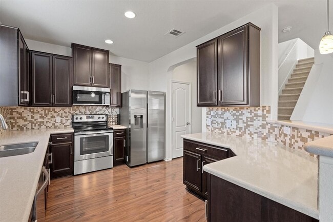 Building Photo - 12036 Pecangate Way