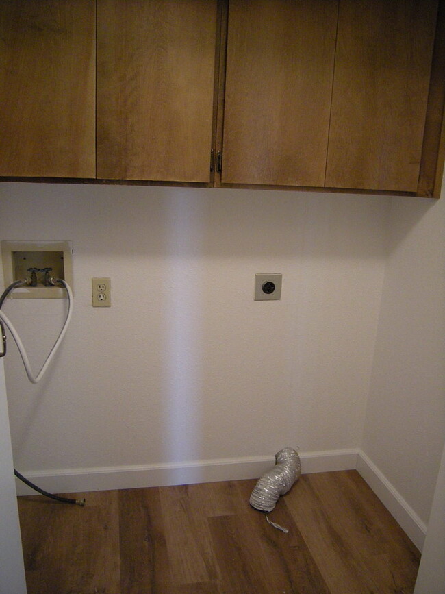 Building Photo - Condo unit featuring updated kitchen with ...